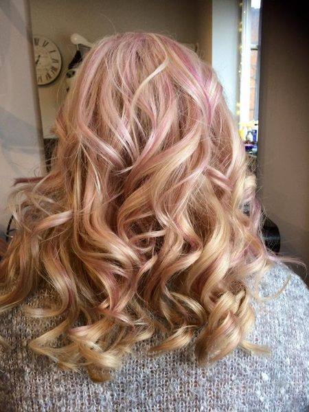 Pink and blonde highlights with curls