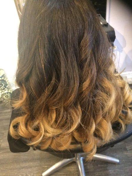 Dark to caramel balayage mid-length