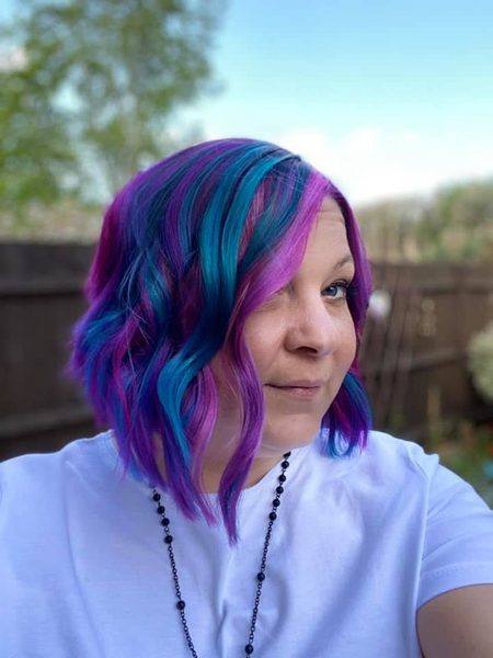 Purple and teal vivid lob with waves