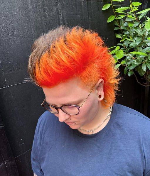Vivid orange fire mohawk alternative cut