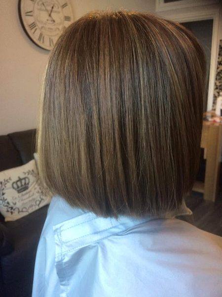 Sleek brunette bob with soft highlights