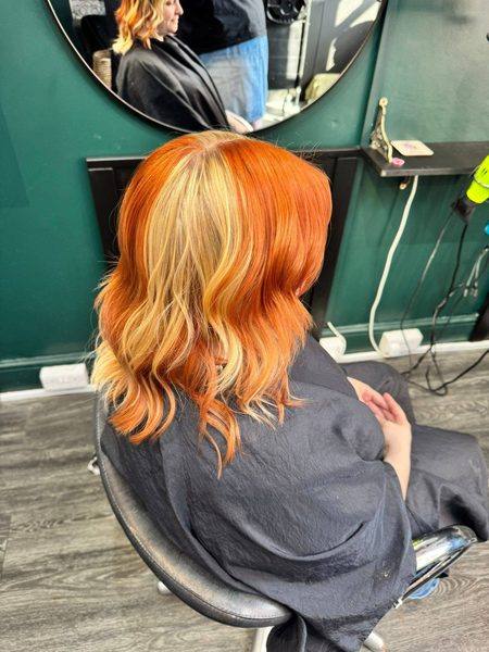 Vivid copper orange with blonde highlights lob